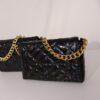 Metallic handbag with gold chain